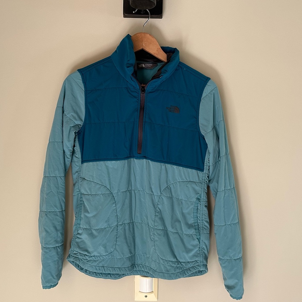 The North Face mountain 1/4 zip size small. Dark and light teal color block